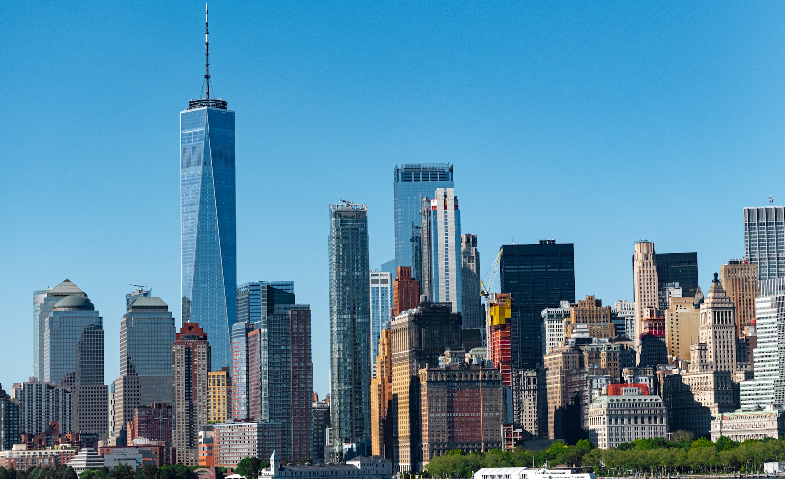 city skyline under blue sky during daytime