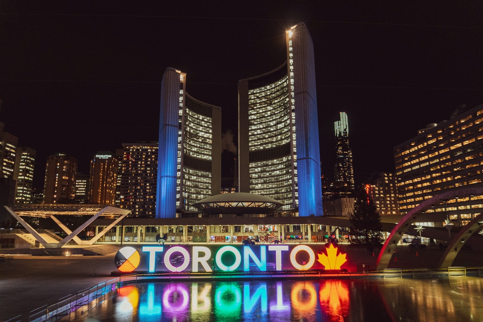 Photo by Conor Samuel Toronto building with lights