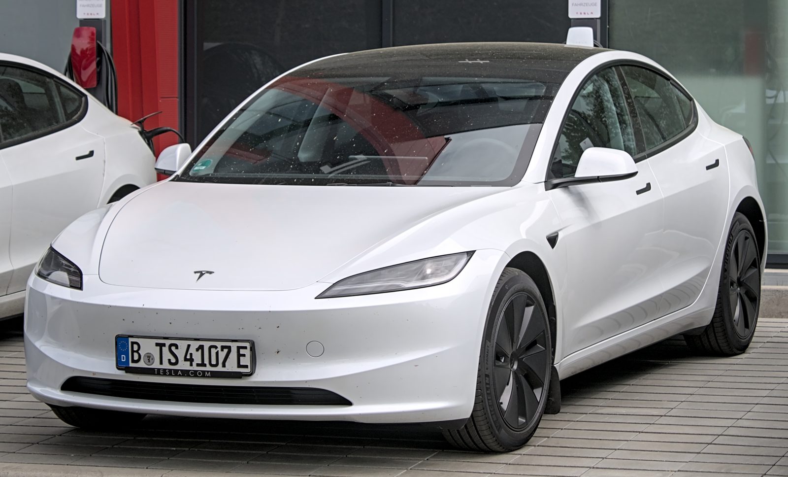 Front view of a Tesla Model 3 showing the clean bumper where a front license plate mounts