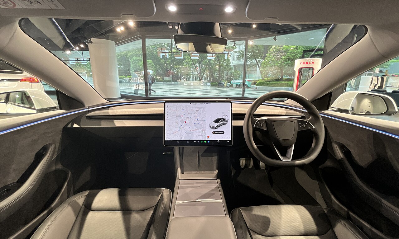 tesla-model-3-white-interior-protection 特斯拉Model 3浅色内饰,展示座椅、中控与门槛等需要保护的部位
