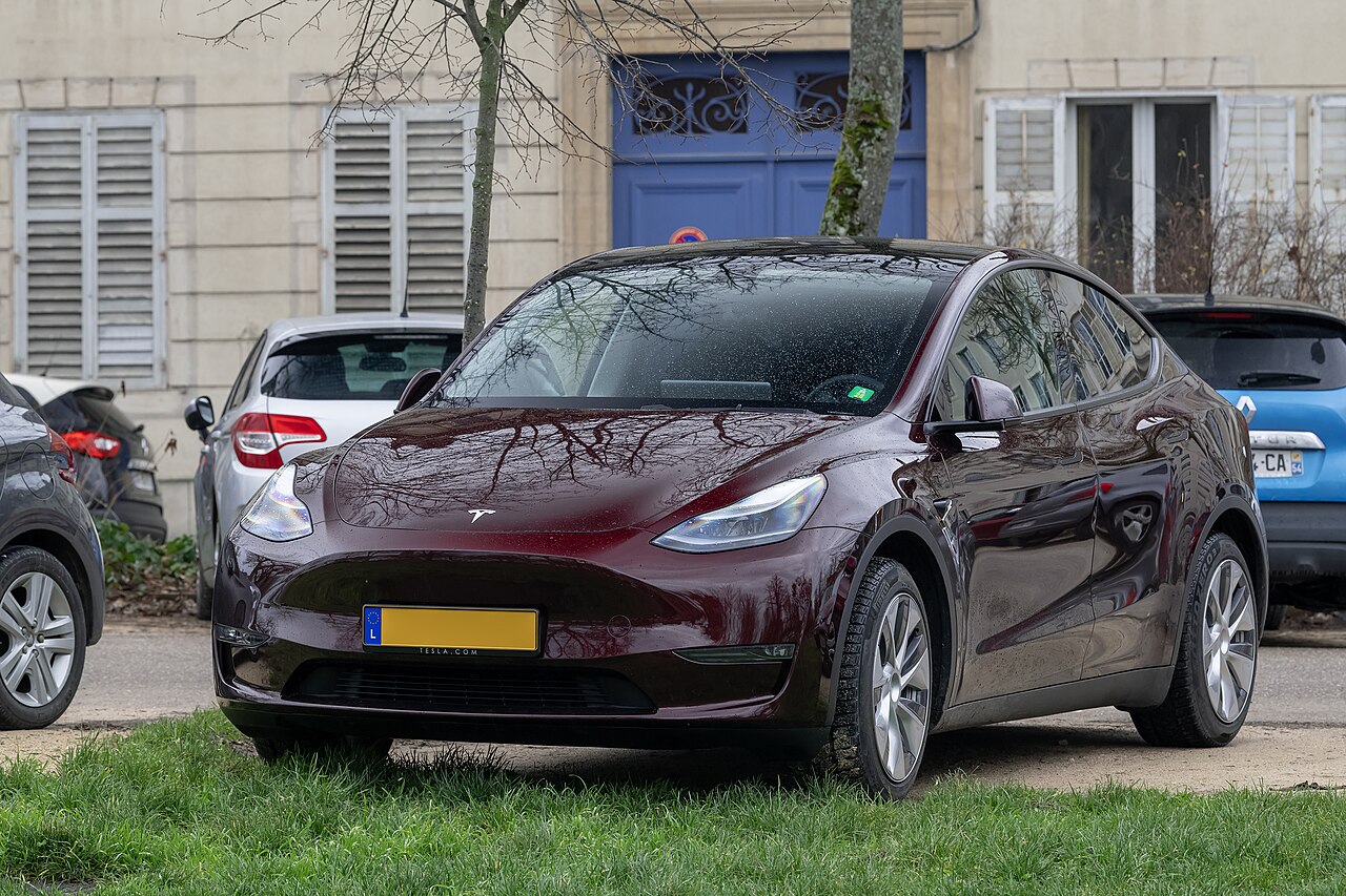 Clean glossy Tesla Model Y exterior showcasing paint finish