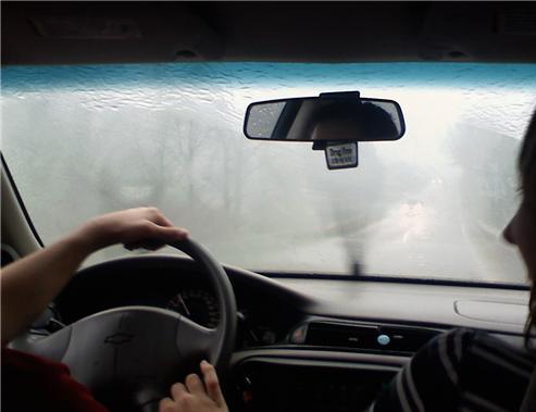 Tesla Driving in the Rain: Auto Wipers, Wiper Blades & Wet-Road Safety (2026)