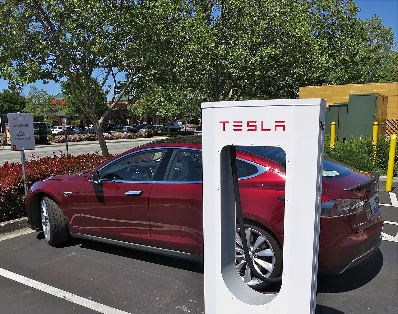 A Tesla charging at a Supercharger station in Gilroy, California