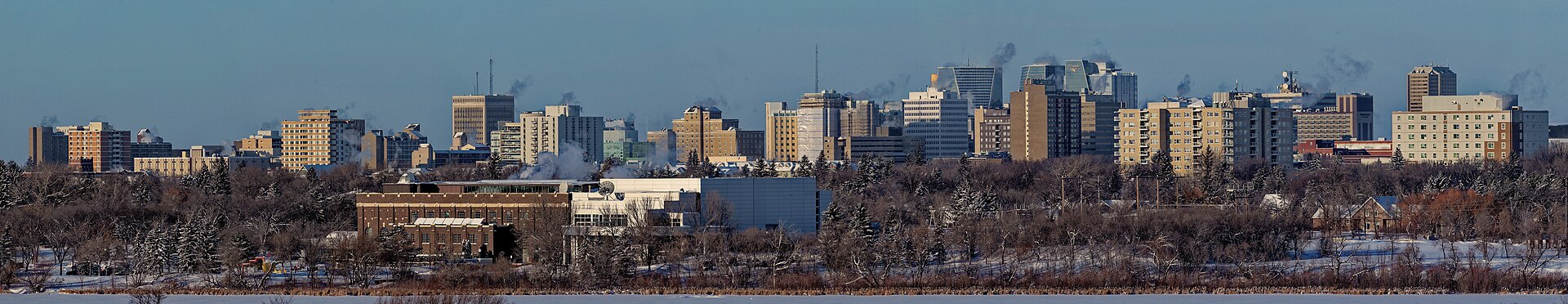regina-saskatchewan-skyline-winter-tesla-guide Regina, Saskatchewan city skyline in winter with snow-covered ground